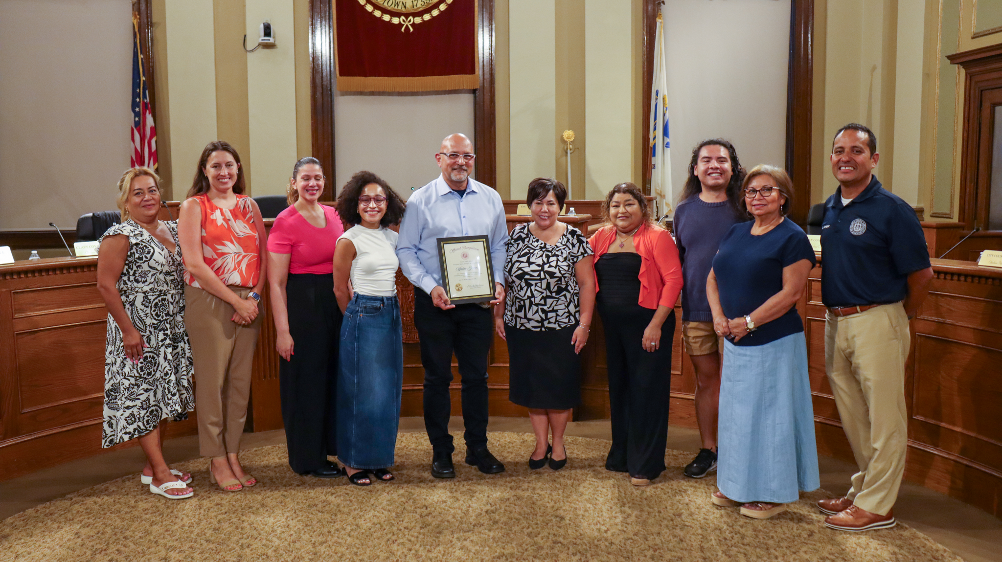 Waldo Gomez pictured with Superintendent Dr. Almi G. Abeyta and the Chelsea School Committee